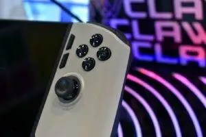 Close-up of a video game controller with colorful background