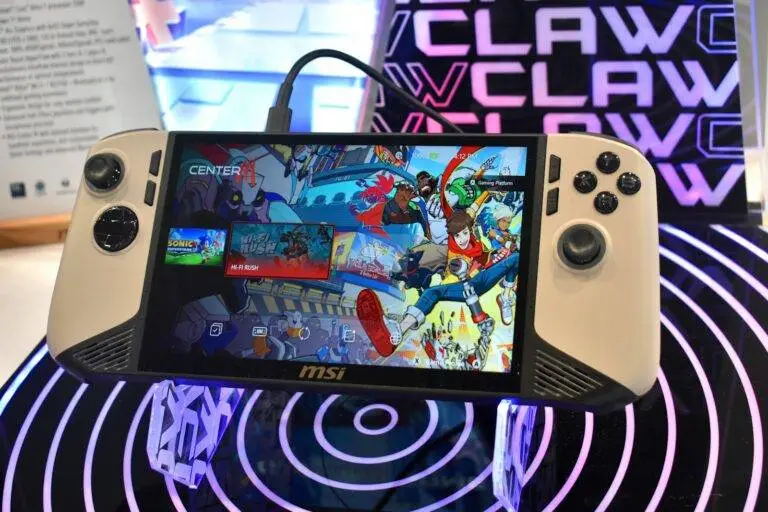 Handheld gaming device with colorful game display.